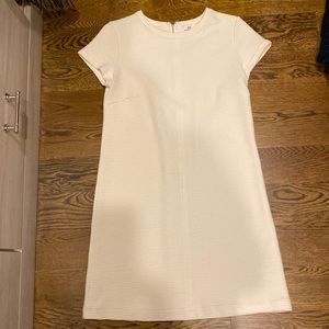 Cream colored, size small short sleeve mid length shift dress